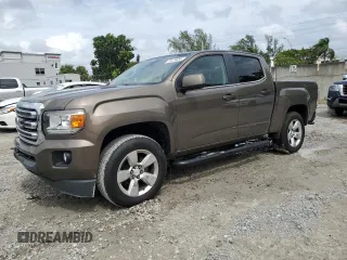 2015 GMC Canyon 4WD SLE with VIN 1GTG6BE38F1263139, listed as a Copart auction lot 75479854 with 124,765 mi miles and Salvage Title. Bid and sale history available at carsss.com. Image 1.