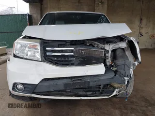 2014 Honda Pilot EX-L with VIN 5FNYF4H59EB047609, listed as a IAAI auction lot 42071353 with 148,661 mi miles and . Bid and sale history available at carsss.com. Image 6.