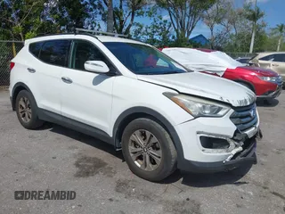2016 Hyundai Santa Fe z VIN 5XYZU3LB3GG309377, wystawiony jako IAAI lot #42198325 z przebiegiem 158 094 mil mil oraz . Historia ofert i sprzedaży dostępna na DreamBid. Obrazek 1.