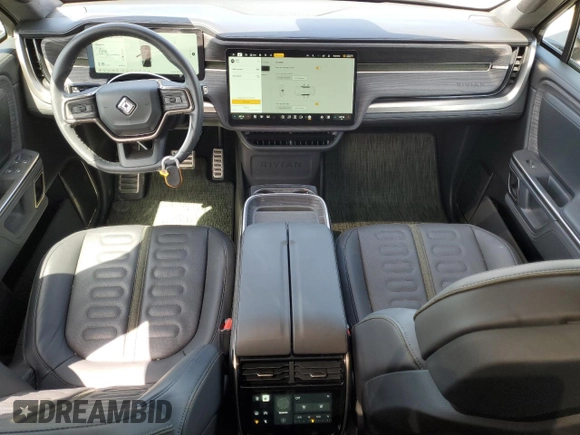2023 Rivian R1S Adventure z VIN 7PDSGBBA5PN024306, wystawiony jako Copart lot #53980375 z przebiegiem 10 389 mil mil oraz Szkoda całkowita • Salvage title. Historia ofert i sprzedaży dostępna na DreamBid. Obrazek 8.