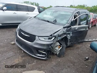 2022 Chrysler Pacifica Touring L with VIN 2C4RC1BG8NR116770, listed as a IAAI auction lot 42093616 with 98,479 mi miles and . Bid and sale history available at DreamBid. Image 17.