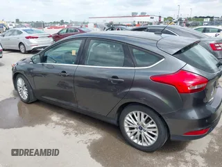 2018 Ford Focus Titanium with VIN 1FADP3N28JL323825, listed as a IAAI auction lot 42341286 with 46,565 mi miles and . Bid and sale history available at DreamBid. Image 14.
