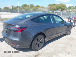 2023 Tesla Model 3 with VIN 5YJ3E1EA8PF626235, listed as a IAAI auction lot 42022893 with 30,333 mi miles and . Bid and sale history available at DreamBid. Image 4.