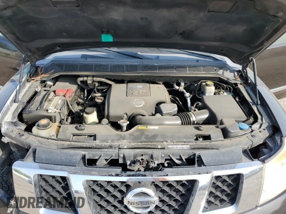 2013 Nissan Armada SL z VIN 5N1BA0ND1DN605912, wystawiony jako Copart lot #53389245 z przebiegiem 165 715 mil mil oraz Szkoda całkowita • Salvage title. Historia ofert i sprzedaży dostępna na DreamBid. Obrazek 14.