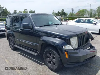 2012 Jeep Liberty Sport z VIN 1C4PJLAK2CW105718, wystawiony jako IAAI lot #42229493 z przebiegiem 126 662 mil mil oraz . Historia ofert i sprzedaży dostępna na DreamBid. Obrazek 1.