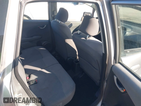2009 Honda Fit z VIN JHMGE88289C002965, wystawiony jako IAAI lot #42382336 z przebiegiem 120 727 mil mil oraz . Historia ofert i sprzedaży dostępna na DreamBid. Obrazek 8.