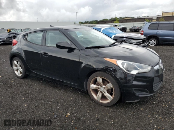 2012 Hyundai Veloster w/Black Int with VIN KMHTC6AD8CU027450, listed as a Copart auction lot 63756415 with 89,037 mi miles and Salvage title. Bid and sale history available at DreamBid. Image 4.