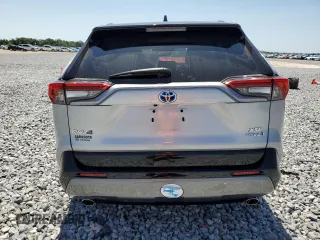 2021 Toyota RAV4 Hybrid XSE with VIN 2T3E6RFV4MW017302, listed as a Copart auction lot 57397275 with 15,544 mi miles and Salvage title. Bid and sale history available at DreamBid. Image 6.