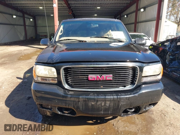 2000 GMC Denali with VIN 1GKEK13R1YR129862, listed as a IAAI auction lot 41833054 with 223,811 mi miles. Bid and sale history available at carsss.com. Image 12.