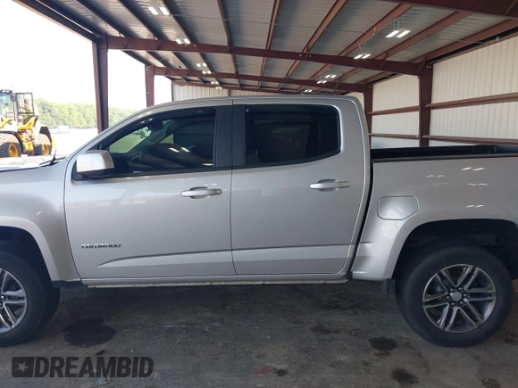 2020 Chevrolet Colorado 4WD Work Truck with VIN 1GCGTBEN3L1215909, listed as a IAAI auction lot 42591564 with 45,369 mi miles and . Bid and sale history available at DreamBid. Image 15.