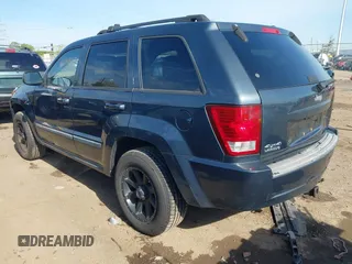 2007 Jeep Grand Cherokee Laredo with VIN 1J8GR48K77C582875, listed as a IAAI auction lot 42061653 with 259,767 mi miles. Bid and sale history available at carsss.com. Image 3.