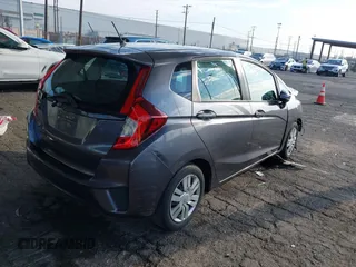 2015 Honda Fit LX with VIN 3HGGK5H58FM713533, listed as a IAAI auction lot 40473868 with Not provided miles and . Bid and sale history available at DreamBid. Image 4.