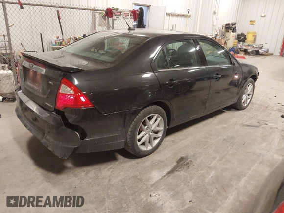 2012 Ford Fusion SEL with VIN 3FAHP0JG9CR414625, listed as a IAAI auction lot 41526061 with 125,315 mi miles and . Bid and sale history available at carsss.com. Image 4.