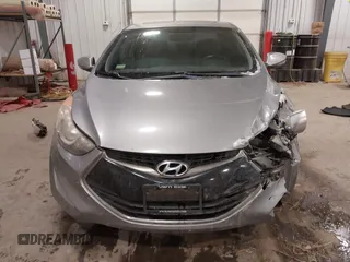 2013 Hyundai Elantra Coupe GS PZEV with VIN KMHDH6AE6DU000893, listed as a IAAI auction lot 41613994 with 94,388 mi miles. Bid and sale history available at carsss.com. Image 13.
