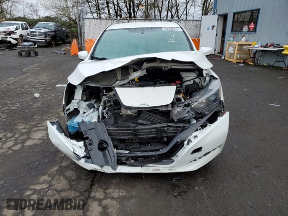2018 Nissan LEAF S with VIN 1N4AZ1CP4JC311722, listed as a Copart auction lot 49008215 with 61,754 mi miles and Salvage Title. Bid and sale history available at DreamBid. Image 5.