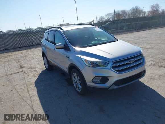2017 Ford Escape SE with VIN 1FMCU0GDXHUB27848, listed as a IAAI auction lot 42047589 with 128,823 mi miles. Bid and sale history available at carsss.com. Image 1.