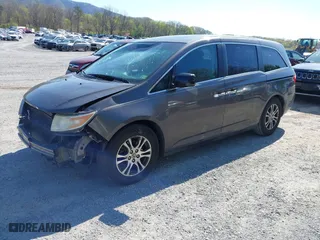 2011 Honda Odyssey EX-L with VIN 5FNRL5H60BB072101, listed as a IAAI auction lot 42002097 with 243,607 mi miles. Bid and sale history available at carsss.com. Image 22.