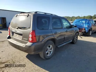 2006 Mazda Tribute S with VIN 4F2YZ06136KM31485, listed as a Copart auction lot 75412344 with Not Provided miles and Salvage Title. Bid and sale history available at DreamBid. Image 3.