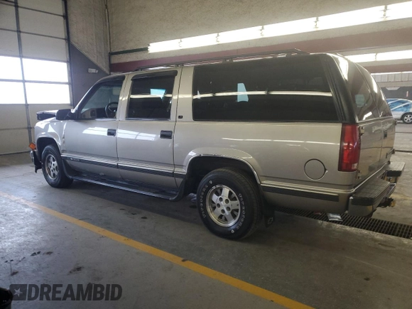 1999 Chevrolet Suburban with VIN 1GNEC16R8XJ543701, listed as a Copart auction lot 84322714 with 211,491 mi miles and Salvage Title. Bid and sale history available at carsss.com. Image 2.