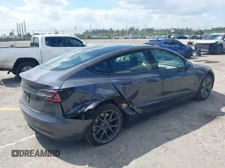 2023 Tesla Model 3 with VIN 5YJ3E1EA3PF623114, listed as a IAAI auction lot 41710385 with 31,663 mi miles and . Bid and sale history available at carsss.com. Image 4.