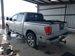 2011 Nissan Titan SL with VIN 1N6AA0EC7BN306488, listed as a IAAI auction lot 41413618 with 102,465 mi miles. Bid and sale history available at carsss.com. Image 3.