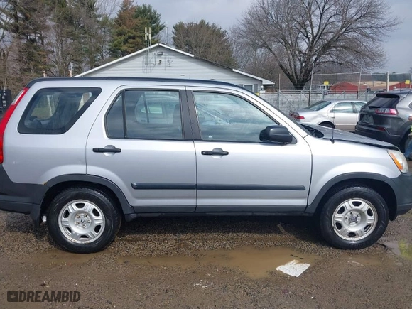 2005 Honda CR-V LX with VIN JHLRD78535C042479, listed as a IAAI auction lot 41682963 with 216,777 mi miles. Bid and sale history available at carsss.com. Image 14.