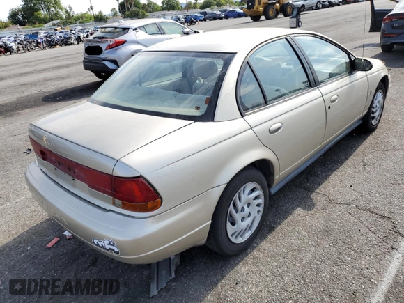 1999 Saturn SL with VIN 1G8ZK5275XZ262816, listed as a Copart auction lot 54144092 with 60,424 mi miles and Salvage title. Bid and sale history available at DreamBid. Image 4.