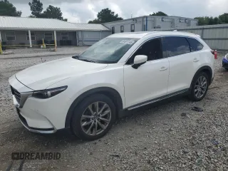 2018 Mazda CX-9 Grand Touring с VIN JM3TCBDY3J0230947, выставлен на аукционе Copart как лот 64901745 с пробегом 109 702 миль миль и Списание • Salvage title. История ставок и продаж доступна на DreamBid. Изображение 1.