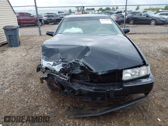 1994 Cadillac Seville STS z VIN 1G6KY5296RU823387, wystawiony jako IAAI lot #42151901 z przebiegiem 165 918 mil mil oraz . Historia ofert i sprzedaży dostępna na DreamBid. Obrazek 13.