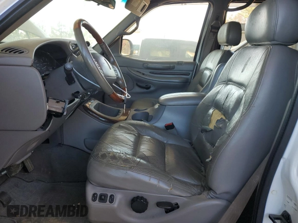 1998 Lincoln Navigator with VIN 5LMEU27L4WLJ06814, listed as a Copart auction lot 87290504 with 204,185 mi miles and Salvage title. Bid and sale history available at DreamBid. Image 7.