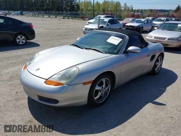 1998 Porsche Boxster с VIN WP0CA2983WU624195, выставлен на аукционе IAAI как лот 42036411 с пробегом 159 202 миль миль и . История ставок и продаж доступна на DreamBid. Изображение 2.