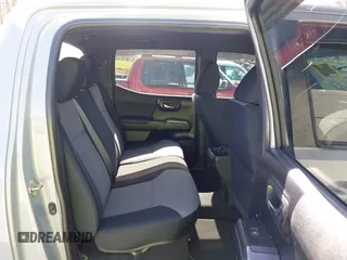 2020 Toyota Tacoma SR5 z VIN 5TFCZ5AN5LX229019, wystawiony jako IAAI lot #41907694 z przebiegiem 79 355 mil mil oraz . Historia ofert i sprzedaży dostępna na DreamBid. Obrazek 8.