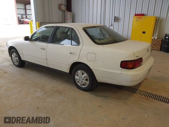 1996 Toyota Camry DX with VIN JT2BG12K3T0401659, listed as a IAAI auction lot 41874795 with 169,406 mi miles. Bid and sale history available at carsss.com. Image 3.