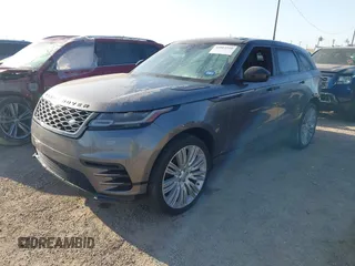 2018 Land Rover Range Rover Velar R-Dynamic SE z VIN SALYL2RX8JA740695, wystawiony jako IAAI lot #42012510 z przebiegiem 93 138 mil mil oraz . Historia ofert i sprzedaży dostępna na DreamBid. Obrazek 2.