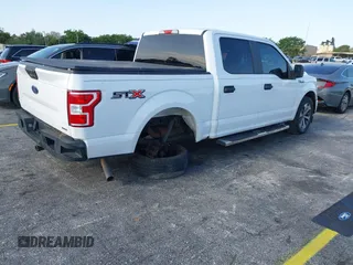 2019 Ford F-150 XL with VIN 1FTEW1CP9KKC27035, listed as a IAAI auction lot 41994993 with 125,879 mi miles and . Bid and sale history available at carsss.com. Image 4.