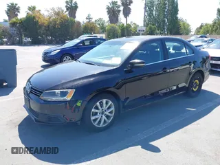 2014 Volkswagen Jetta SE with VIN 3VWD17AJ9EM372677, listed as a IAAI auction lot 42406449 with 266,331 mi miles and . Bid and sale history available at DreamBid. Image 2.