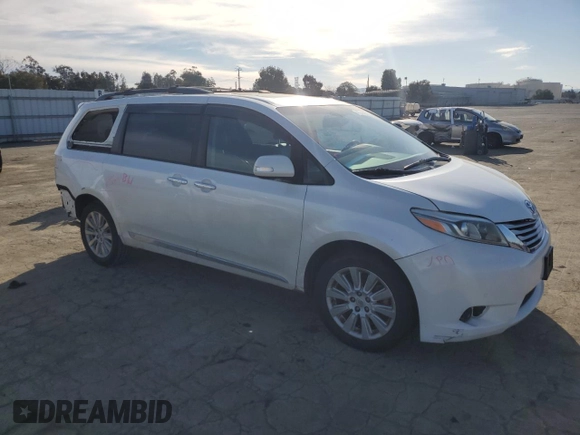 2015 Toyota Sienna Limited with VIN 5TDDK3DC2FS099332, listed as a Copart auction lot 47571435 with 107,449 mi miles and Salvage Title. Bid and sale history available at DreamBid. Image 4.