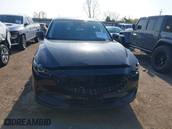 2019 Mazda CX-5 Touring with VIN JM3KFACM6K0533203, listed as a IAAI auction lot 41973125 with 106,882 mi miles and . Bid and sale history available at carsss.com. Image 13.