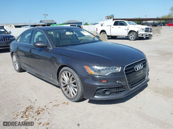2012 Audi A6 3.0T Prestige with VIN WAUHGBFC8CN078333, listed as a IAAI auction lot 42001507 with 121,527 mi miles. Bid and sale history available at carsss.com. Image 1.