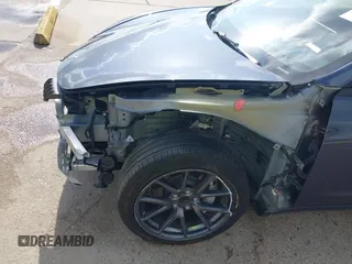 2023 Tesla Model 3 with VIN 5YJ3E1EA7PF567906, listed as a IAAI auction lot 42280993 with 41,452 mi miles and . Bid and sale history available at DreamBid. Image 21.