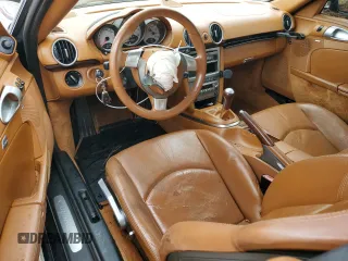 2006 Porsche Cayman S с VIN WP0AB298X6U781940, выставлен на аукционе Copart как лот 70092204 с пробегом 116 506 миль миль и Списание • Salvage title. История ставок и продаж доступна на DreamBid. Изображение 8.