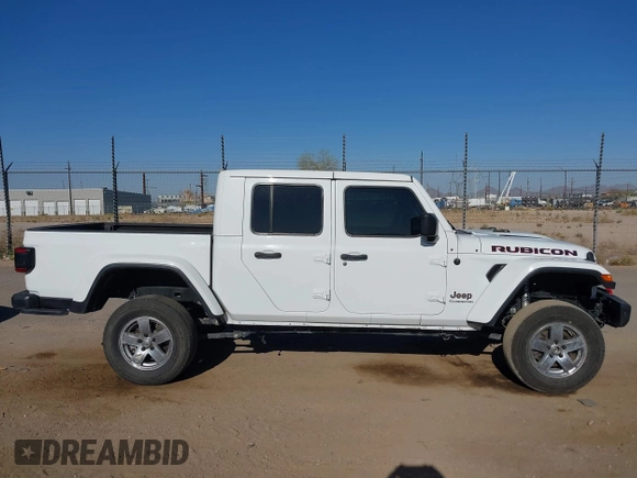 2020 Jeep Gladiator Rubicon with VIN 1C6JJTBG6LL187235, listed as a IAAI auction lot 42010374 with Not Provided miles and . Bid and sale history available at DreamBid. Image 13.