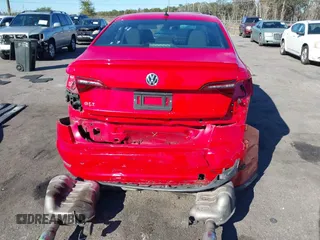 2019 Volkswagen Jetta GLI S z VIN 3VW5T7BU3KM225015, wystawiony jako IAAI lot #41352228 z przebiegiem 96 874 mil mil oraz . Historia ofert i sprzedaży dostępna na DreamBid. Obrazek 16.