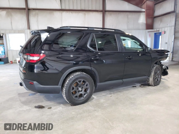 2023 Honda Pilot TrailSport with VIN 5FNYG1H63PB031249, listed as a Copart auction lot 85163934 with 12,058 mi miles and Salvage Title. Bid and sale history available at carsss.com. Image 3.