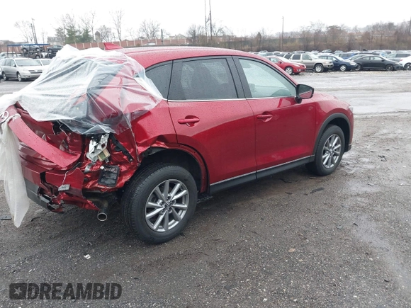 2023 Mazda CX-5 2.5 S Select Package with VIN JM3KFBBM8P0199092, listed as a IAAI auction lot 41851908 with 34,491 mi miles. Bid and sale history available at carsss.com. Image 4.