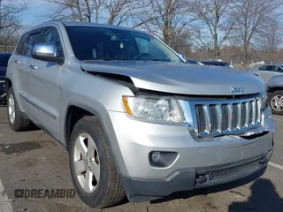 2011 Jeep Grand Cherokee Laredo z VIN 1J4RR4GG2BC511289, wystawiony jako IAAI lot #41240075 z przebiegiem 88 140 mil mil oraz . Historia ofert i sprzedaży dostępna na DreamBid. Obrazek 1.