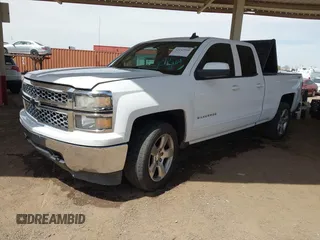 2015 Chevrolet Silverado 1500 LT with VIN 1GCVKREC1FZ415386, listed as a IAAI auction lot 42142990 with 165,409 mi miles and . Bid and sale history available at DreamBid. Image 2.