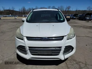 2014 Ford Escape SE with VIN 1FMCU0GX4EUB83323, listed as a Copart auction lot 51775125 with 129,437 mi miles and Salvage Title. Bid and sale history available at DreamBid. Image 5.