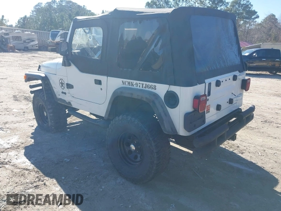 1997 Jeep Wrangler Sport with VIN 1J4FY19S7VP483735, listed as a IAAI auction lot 41469983 with 150,542 mi miles. Bid and sale history available at carsss.com. Image 3.