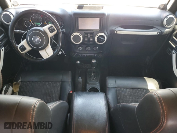 2012 Jeep Wrangler Arctic z VIN 1C4AJWBGXCL156600, wystawiony jako Copart lot #56369065 z przebiegiem 216 808 mil mil oraz Szkoda całkowita • Salvage title. Historia ofert i sprzedaży dostępna na DreamBid. Obrazek 8.